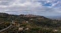 long winding road leading to the Tuscan hilltop village of Montepulciano