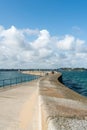 The long and winding stone harbor jetty in Saint-Malo