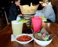 Long wood tables with fresh food and tasty drinks, Cantina Restaurant, Saratoga, NY, 2020