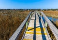 Long Wooden Bridge Over The Salt Marsh of The Waccamaw Rive Royalty Free Stock Photo