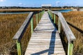 Long Wooden Bridge Over The Salt Marsh of The Waccamaw River Royalty Free Stock Photo