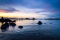 Long wooden bridge in tropical island beach at sunset Koh Mak