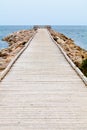 Long Wooden Dock with Observatory and View of the Ocean Royalty Free Stock Photo