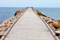 Long Wooden Dock with Observatory and View of the Ocean Royalty Free Stock Photo