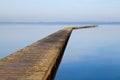 Long wooden pier on big lake Royalty Free Stock Photo