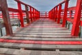 Long Wooden Red Bridge at beach sea , Samut Sakhon ,Thailand Royalty Free Stock Photo