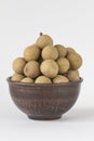 Longan in ceramic pial isolated on white background - exotic fr Royalty Free Stock Photo