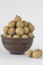 Longan in ceramic pial isolated on white background - exotic fr Royalty Free Stock Photo