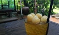 Longan fruit on the glass of sweet logan juice on dark timber table