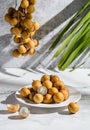 longan on a light background