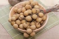 Longan on wood bowl Royalty Free Stock Photo