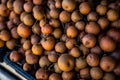 Longans on display for sale at a local market