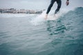 Longboard surfer nose ride on a small wave