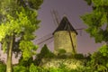 The Longchamp racecourse mill at night in Paris Rouvray mill