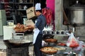 LongFeng, China: Chef Cooking at Restaurant