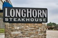 Longhorn Steakhouse sign in Deerbrook Mall in Humble, TX.