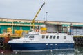Longlining fishing vessel Aki i Brekku unloading in port Royalty Free Stock Photo