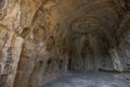 Buddha sculpture in cave interior of Luoyang Longmen Grottoes, Henan, China Royalty Free Stock Photo