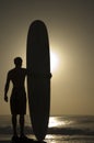 Longoard at sunset 1 Royalty Free Stock Photo