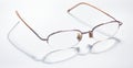 Longsighted prescription glasses with shadow arranging on white background