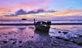 Longtail boat on the beach of Lipe island at dawn