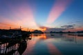 Longtail boat with coastal fishing village,Beautiful scenery view in morning sunrise over sea and mountain at phang - nga thailand Royalty Free Stock Photo