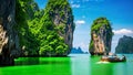 Longtail boat at Ha Long bay, Quang Ninh province, Vietnam, Amazed nature scenic landscape of James Bond Island with a boat for a