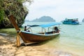 Longtail boat and a tourist cruise boat, Phang Nga Bay, Thailand Royalty Free Stock Photo