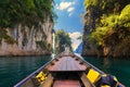 Longtail boat trip in Cheow Lan Lake, Khao Sok National Park, Surat Thani Province, Thailand.