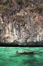 Longtail boat in turquoise waters Royalty Free Stock Photo