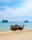 Longtail boats on the beach of Koh Ngai island tropical Island in the Andaman Sea Trang in Thailand Royalty Free Stock Photo