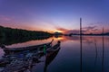 Longtail boats with coastal fishing village ,Beautiful scenery morning sunrise over sea and mountain in phang - nga thailand Royalty Free Stock Photo