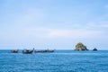 Longtail boats over Jabang dive site at Koh Lipe Thailand