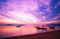 Longtail boats with Travel boats in tropical sea Beautiful scenery morning sunrise or sunset sky over sea and mountain in phuket Royalty Free Stock Photo