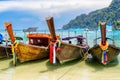 Longtail boats in tropical beach in Phi-Phi island, Thailand Royalty Free Stock Photo