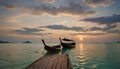 Longtail wooden thai boats at sunset. Royalty Free Stock Photo