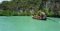 Longtailboat in lagoon