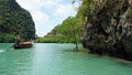 Longtailboat in lagoon