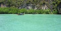 Longtailboat in lagoon