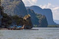 Longtailed speed boats moored at the edge of the settlement built on stilts of Ko Panyi in Phang Nga Bay, Thailand Royalty Free Stock Photo