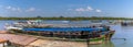 Longtailed speed boats moored on the landing bay on the settlement of Ko Panyi in Phang Nga Bay, Thailand Royalty Free Stock Photo