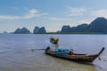 Longtailed speed boats moored off the settlement and island of Ko Panyi in Phang Nga Bay, Thailand Royalty Free Stock Photo