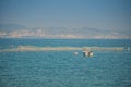 Lonley empty fishing boat drifting in the sea Royalty Free Stock Photo