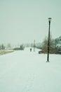 Lonley walk in the snow on a cold winters day