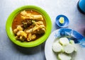 Lontong Kikil, a traditional food from Surabaya, East Java, Indonesia, made from curried cow\'s leg skin