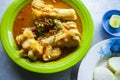 Lontong Kikil, a traditional food from Surabaya, East Java, Indonesia, made from curried cow\'s leg skin