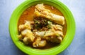 Lontong Kikil, a traditional food from Surabaya, East Java, Indonesia, made from curried cow\'s leg skin