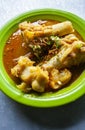 Lontong Kikil, a traditional food from Surabaya, East Java, Indonesia, made from curried cow\'s leg skin