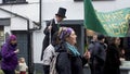 Looe, Cornwall, UK, February 16, 2019. Mixed group of `Extinction Rebellion` protesters, marching through the Cornish town of Looe