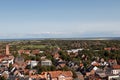 A look from above the lighthouse over the northern sea island borkum on the sea at the horizon